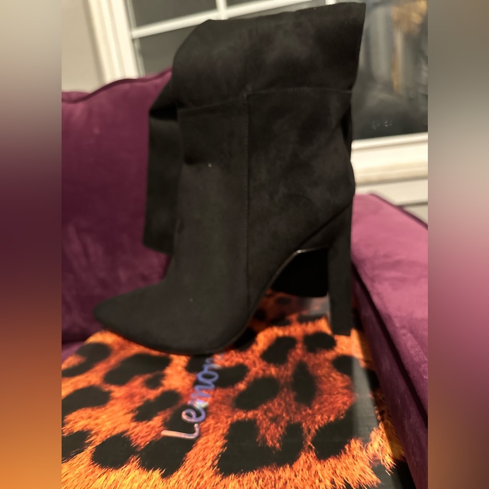 Black fashion boots. Never worn! Excellent condition. Paid $75 for them.